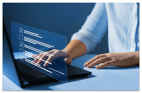 Cybersecurity professional working on laptop implementing Zero Trust Application Security policy